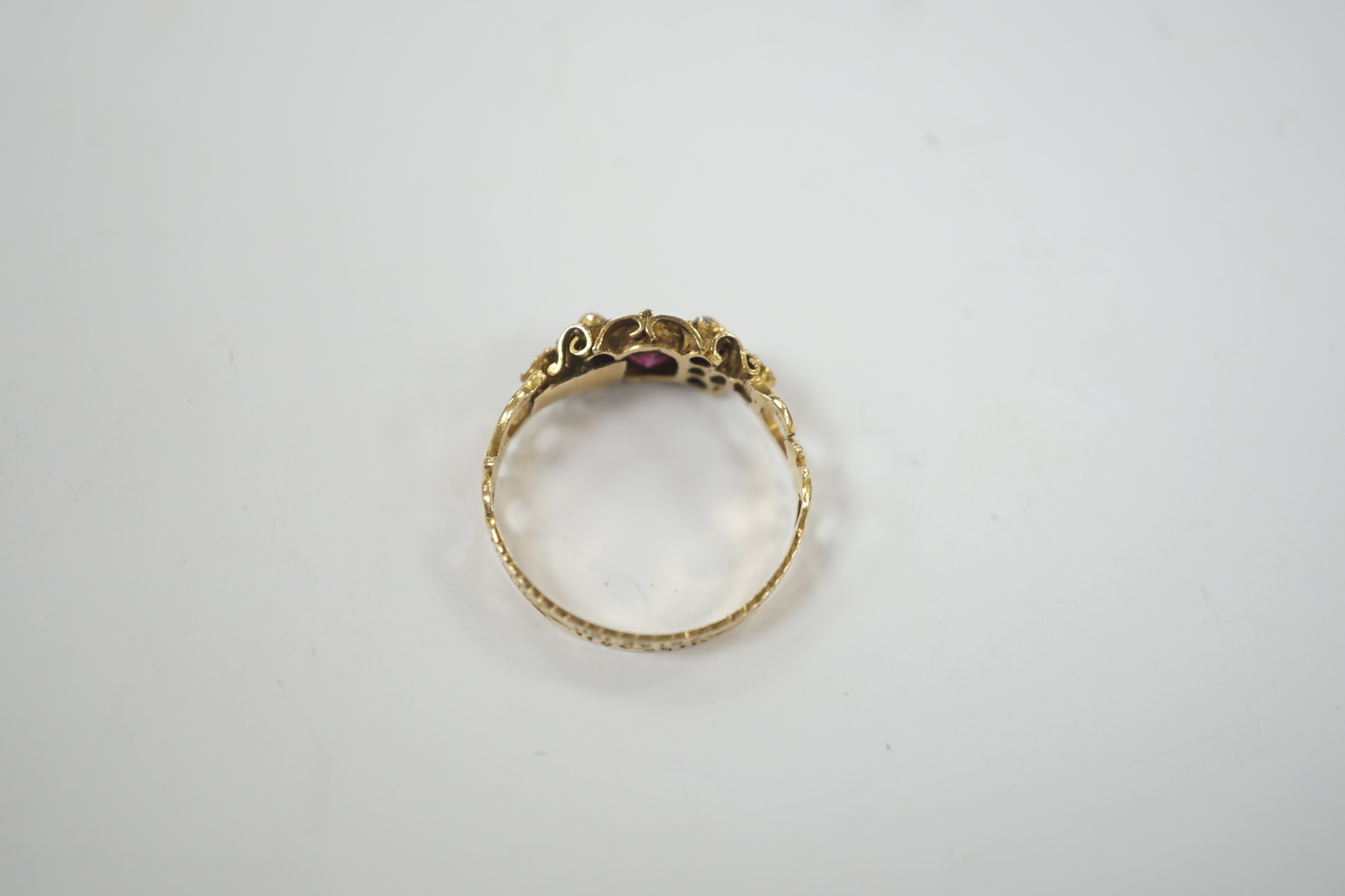 A Victorian yellow metal, garnet, ruby? and emerald set dress ring, (stones missing), size L, gross weight 1.8 grams.